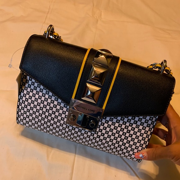 michael kors taxi purse
